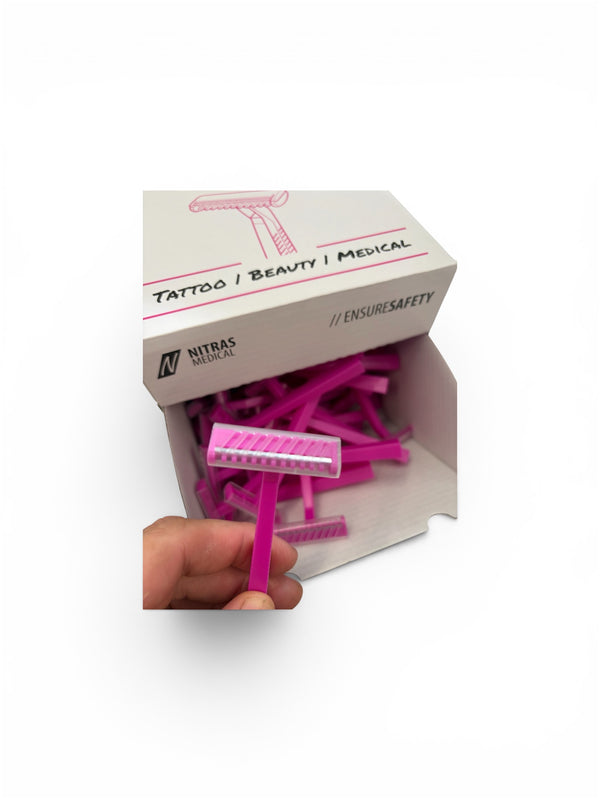 Pink disposable razor